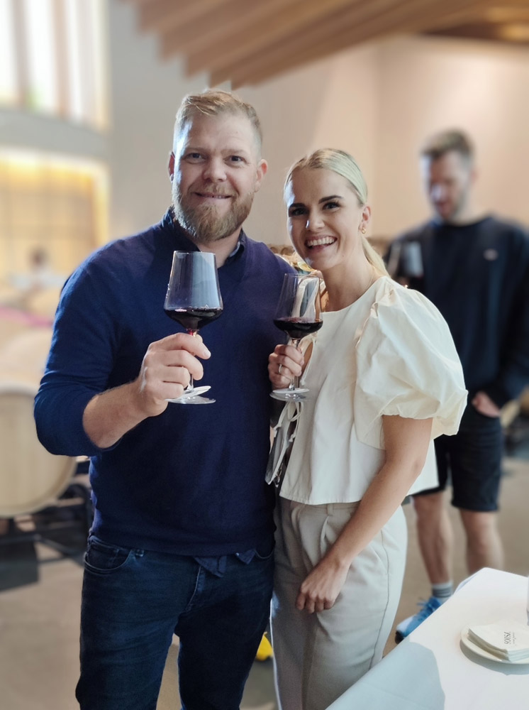 A couple enjoying a wine taste experience